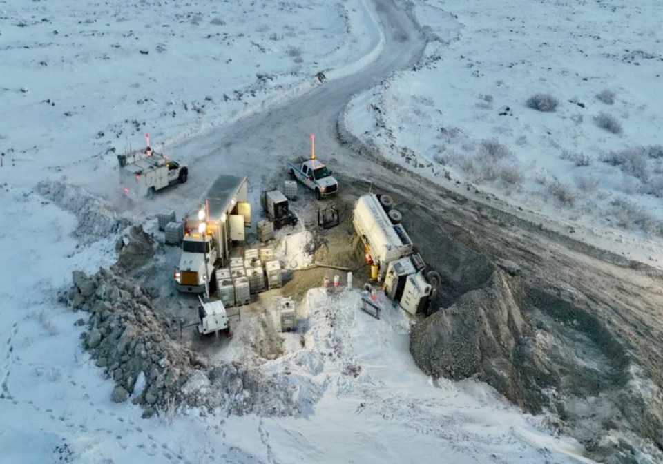 An image published to the public registry by Diavik shows efforts to contain and pump off the fuel.